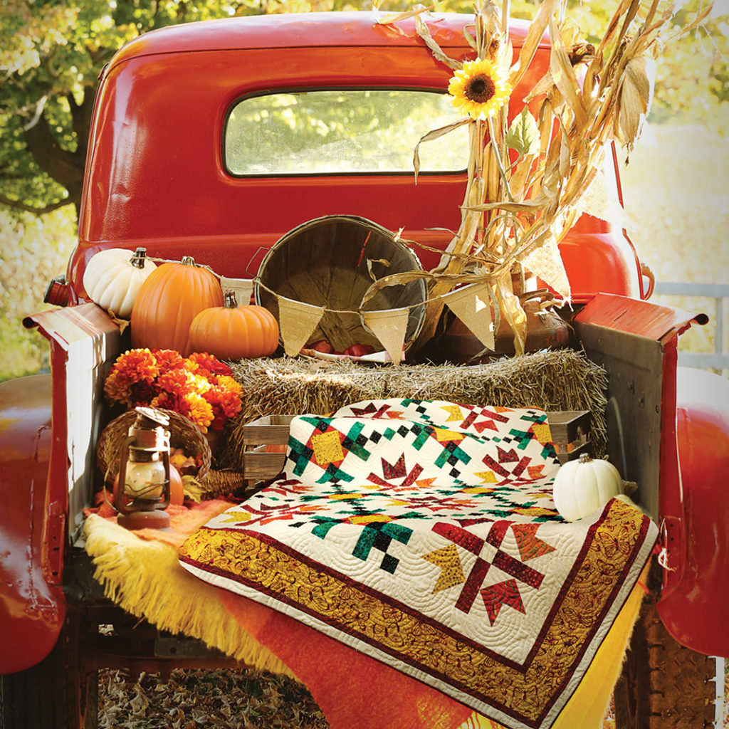 Corn maze and pumpkin spice on a quilt
