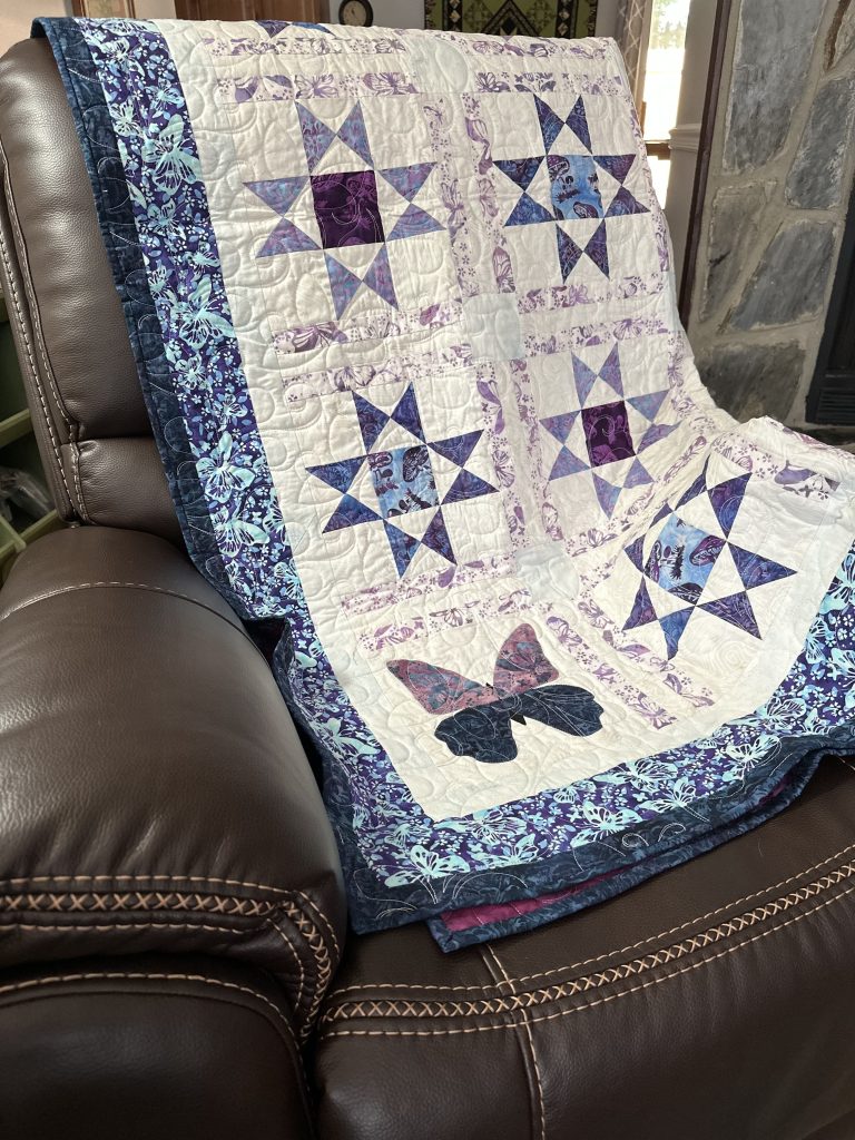 appliqué butterfly and stars quilt