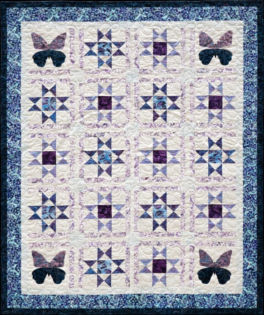 appliqué butterfly and stars quilt